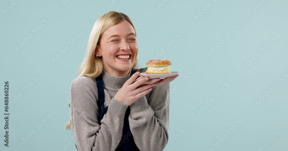 Waitress, excited and woman with high tea dessert order for customer service with hospitality in studio. Coffee shop, cafe or small business employee with smile from cake order and blue background Waitress, excited and woman with high tea dessert order for customer service with hospitality in studio. Coffee shop, cafe or small business employee with smile from cake order and blue background