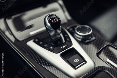 Tableau sur toile Modern car automatic gearbox shift handle and carbon panel