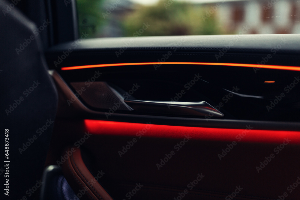 Modern car door panel illumination. Car interior illumination 