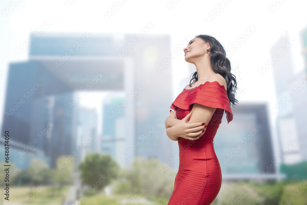 Elegant Asian Woman in Red Dress in Cityscape Elegant Asian Woman in Red Dress in Cityscape