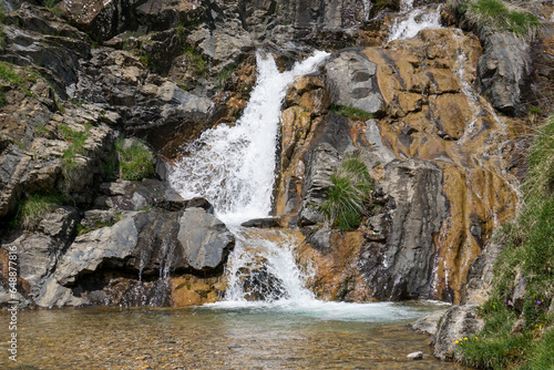 Otal waterfall in valley bujaruelo in pyrenees photo