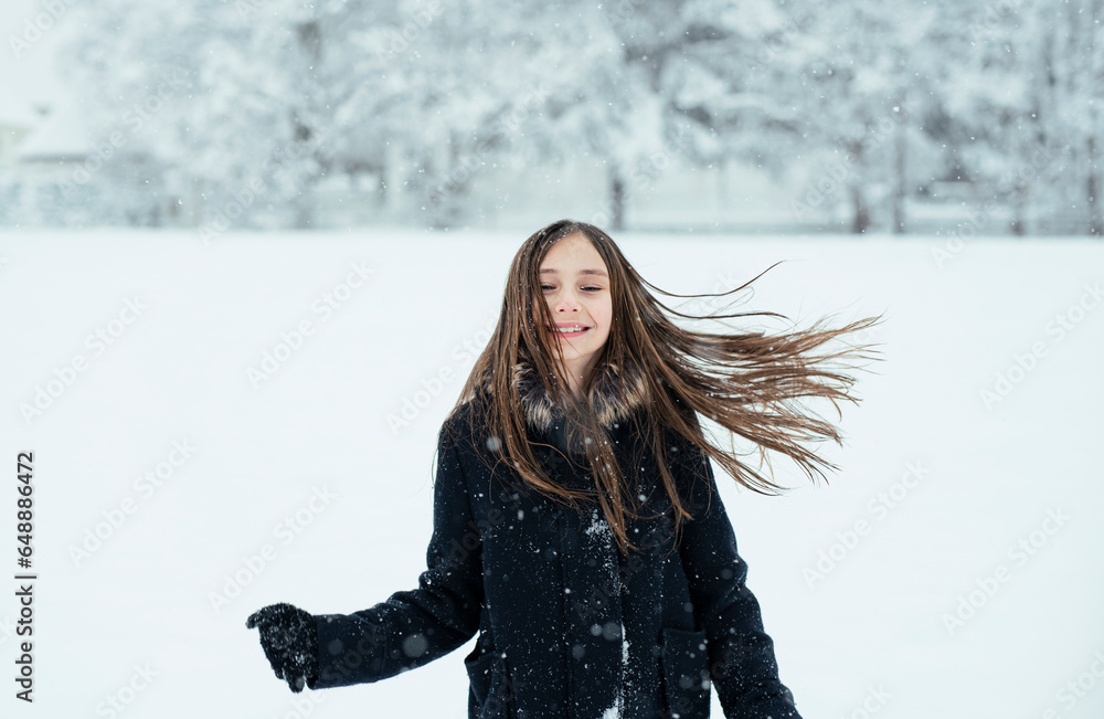 Little cute girl having a fun with a snow in winter cold weather. Winter season joying. Little cute girl having a fun with a snow in winter cold weather. Winter season joying.