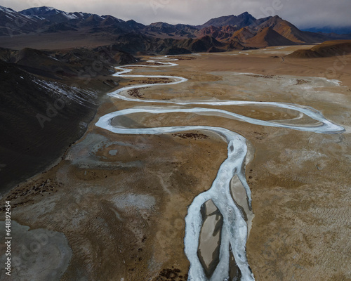 River glacier flowing through the mountains in ladakh 