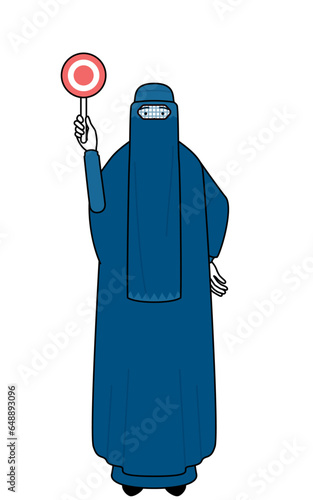 Muslim woman in burqa holding a maru placard that shows the correct answer.