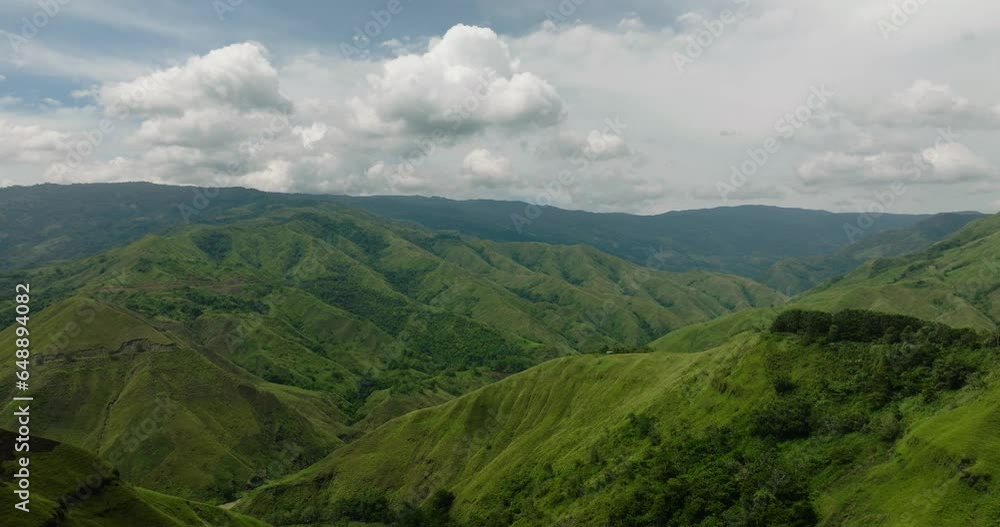 Mountains with green hills and grass in Bukidnon. Mindanao, Philippines. Mountains with green hills and grass in Bukidnon. Mindanao, Philippines.