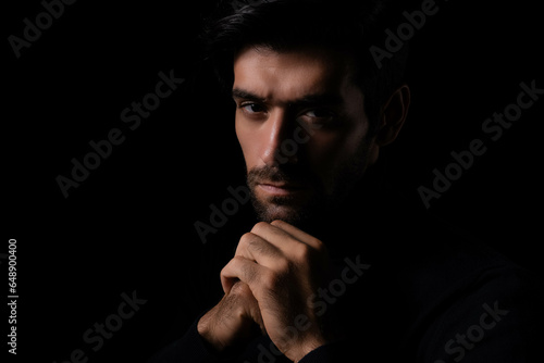 Confident Bearded man portrait Thinking stylish young man looking at camera with Black Background Bearded stylish businessman look confident Handsome thoughtful leader young guy thinking something 