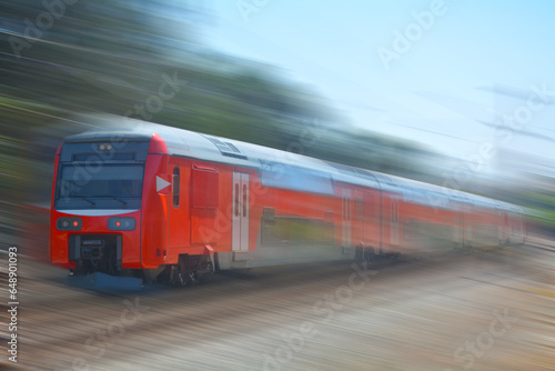 red train at high speed, speed blur, train track