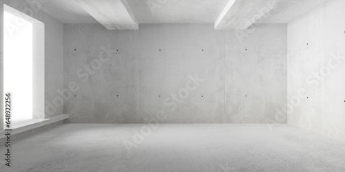Abstract empty, modern concrete room with window opening on the left, ceiling beams and rough floor - industrial interior background template