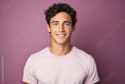 Portrait of a Fictional Male Model Smiling. Isolated on a plain background. Generative AI. © Tuyres