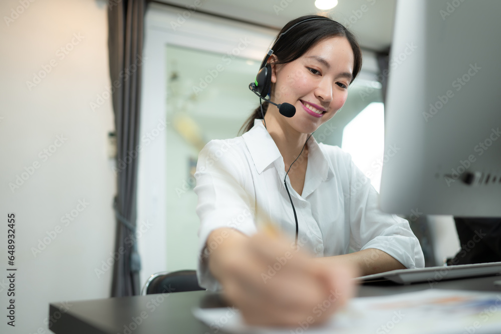 Portrait of business people wearing headset working actively in office. Call center, telemarketing, customer support agent provide service on telephone video conference call. Portrait of business people wearing headset working actively in office. Call center, telemarketing, customer support agent provide service on telephone video conference call.