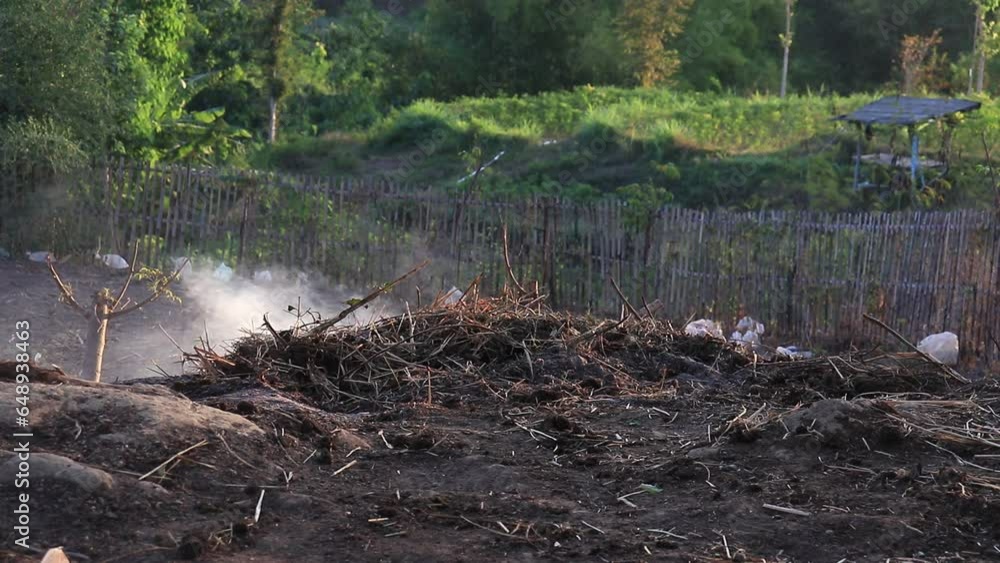 landfills, burnt trash, burnt cow food grass waste, indonesia village landfills, burnt trash, burnt cow food grass waste, indonesia village