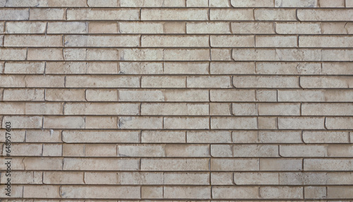 白っぽいブラウンカラーの住宅の壁のタイルのテクスチャ