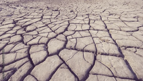 Detail of dry arid desert cracked soil, no rain due to global warming climate change