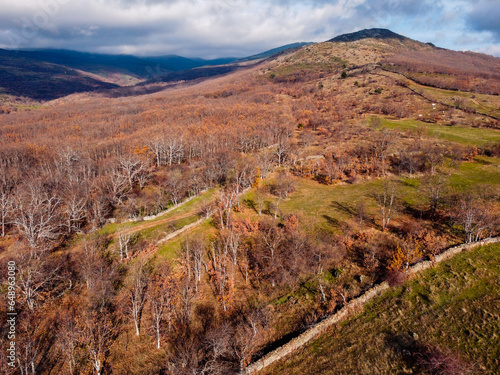 Aerial drone view of the Mountain Range of Rincon in Madrid during autumn Sierra del Rincon in Madrid