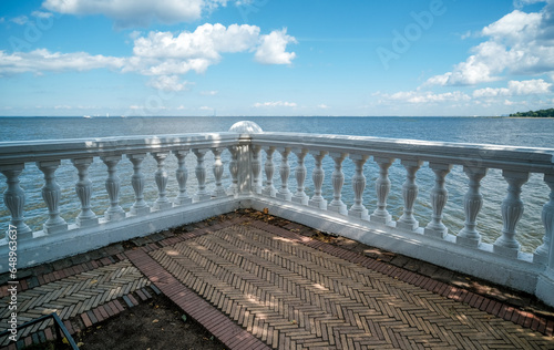 Marble parapet on the seashore . Fencing on the embankment.