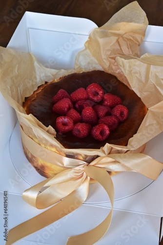 San Sebastian Cheesecake with raspberry in the box