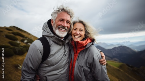 Mountain embrace: a senior couple, enveloped by majestic peaks, cherishing their journey. Generative ai.