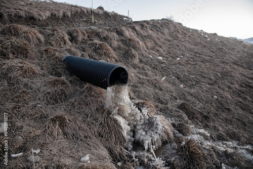 frozen water flowing from a pipe
