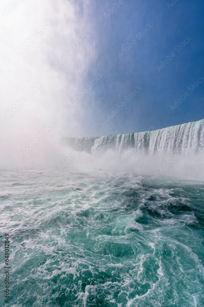 Wide angle view of Horseshoe Falls waterfall at sunny day, view from the boat