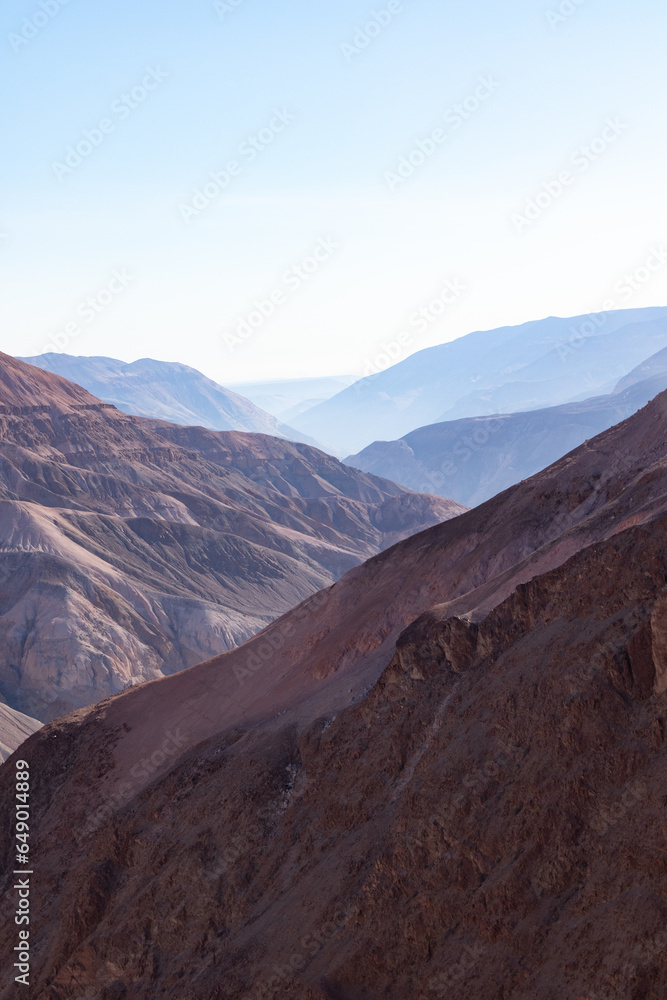 Fototapeta premium interior arid road in the Camarones valley, Arica and Parinacota region
