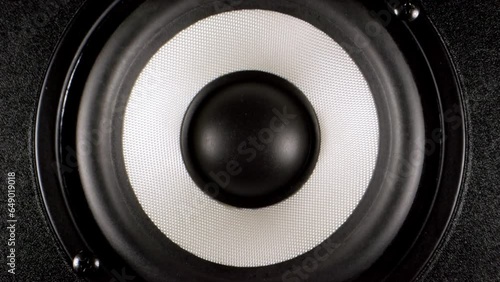 Audio Speaker. Speakers making loud sound music. Close up of loud bass speaker vibration.