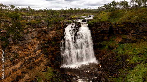 Aerial view of a salmon river in Norway with waterfall. created without Ai photo