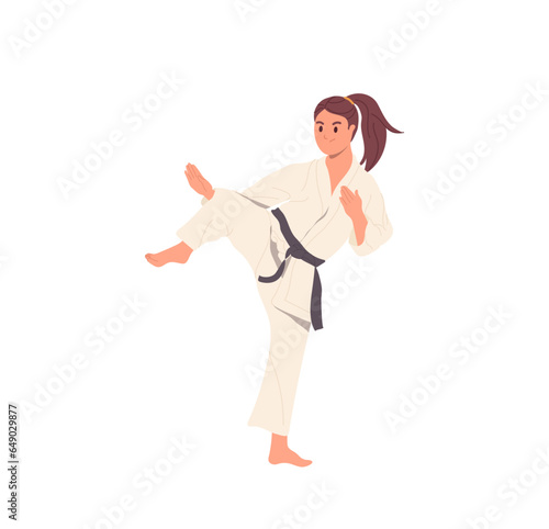 Athletic taekwondo sportswoman in kimono presenting strength and skills on sportive training