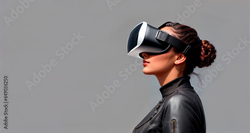 woman in a black leather jacket and virtual glasses on her head, on a gray background, futuristic, futurism. Generative AI © shacil