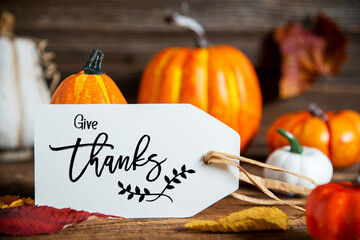 Orange Pumpkin Decoration With Label With Text Give Thanks