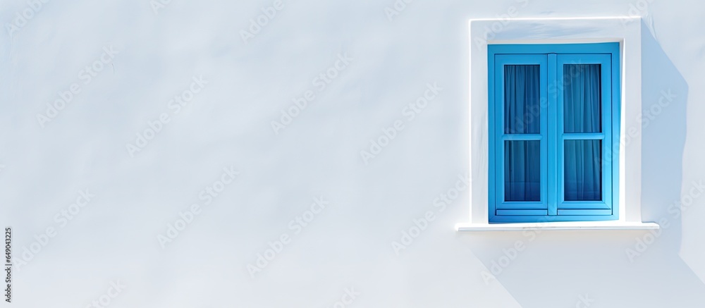 Blue window against a white wall