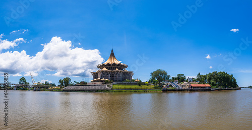 Kuching city waterfront panorama cityscape with river and landmarks in Sarawak, Malaysia.  photo