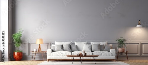 A spacious living room with a grey sofa lamp wooden table and carpeted wall for mock up