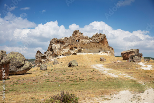 Historical ancient Frig (Phrygia, Gordion) Valley. Tomb (shrine, turbe) and old cemetery. Frig Valley is popular tourist attraction in the Yazilikaya, Afyon - Turkey. photo