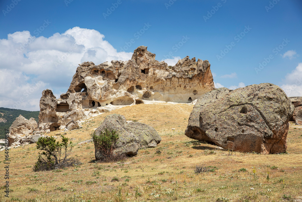 Fototapeta premium Historical ancient Frig (Phrygia, Gordion) Valley. Tomb (shrine, turbe) and old cemetery. Frig Valley is popular tourist attraction in the Yazilikaya, Afyon - Turkey.