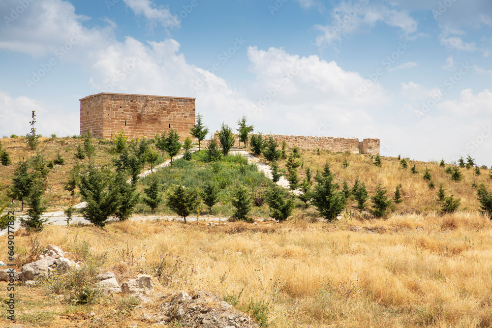 Historical ancient Frig (Phrygia, Gordion) Valley. Tomb (shrine, turbe) and old cemetery. Frig Valley is popular tourist attraction in the Yazilikaya, Afyon - Turkey.
