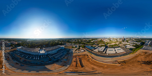 Aerial 360 equirectangular vr drone photo of commercial shopping mall under construction