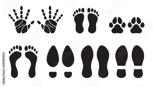 Animal footprints, handprints, footprints of children and adults on a white background. Symbols for use in printing stickers and assembling graphics.