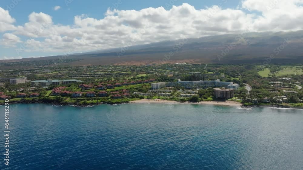 Low flying aerial view establishing shot of empty sandy beaches in Wailea, Maui, Hawaii Low flying aerial view establishing shot of empty sandy beaches in Wailea, Maui, Hawaii