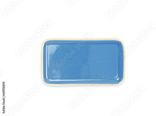 Top view, empty blue rectangle ceramic plate isolated on a white background. Use for home or restaurant, food design. Kitchen accessory. .