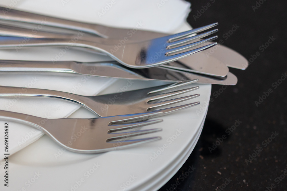 Set of Fork and knife with white plate Set of Fork and knife with white plate