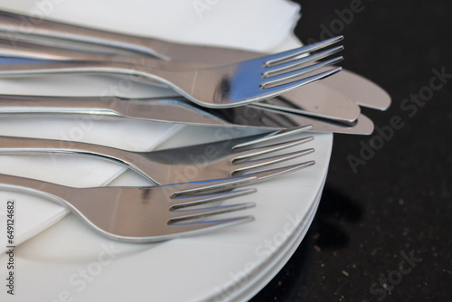 Set of Fork and knife with white plate