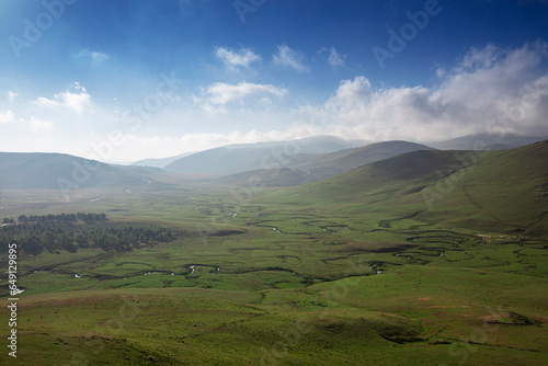 Ordu Persembe Plateau, Persembe Plateau is a popular plateau famous for meandering. Green grass has streams in it. known as in Turkish "Perşembe Yaylasi".Aerial shot. Magnificent flocks of sheep