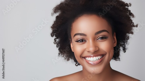 Smile of black woman with perfect white teeth. 