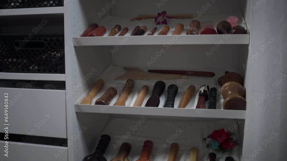 Wooden massage tools on a shelf Wooden massage tools on a shelf