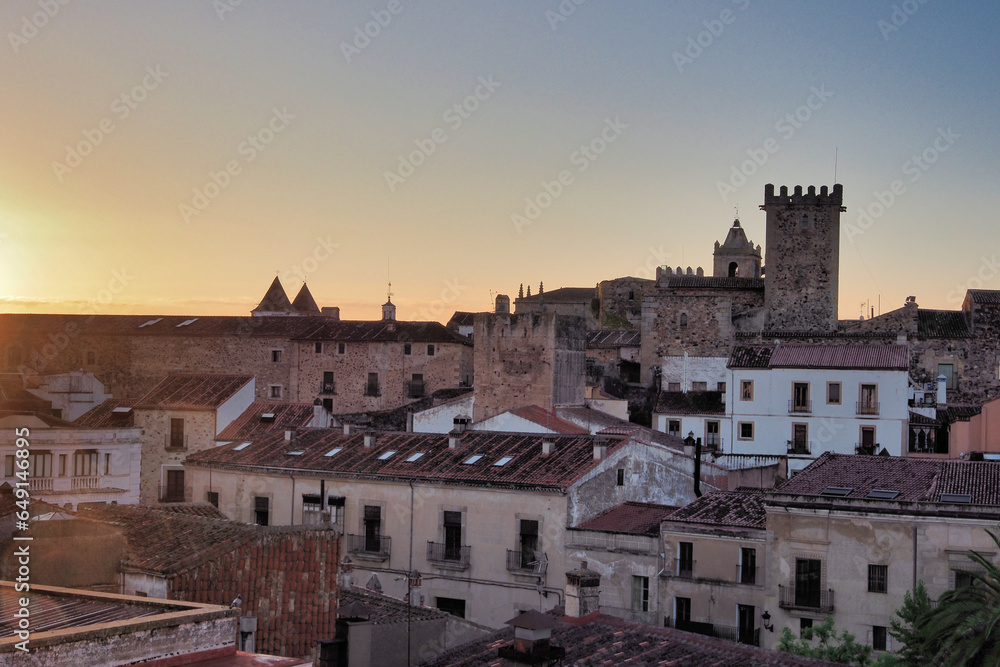 view of the city of caceres at dawn