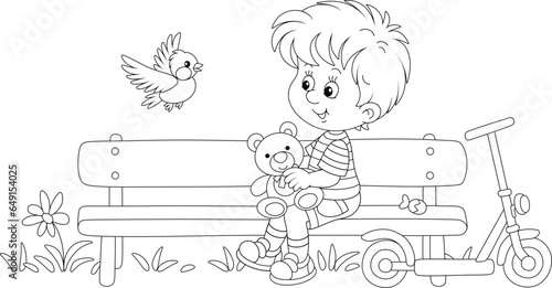 Happy little boy playing with his funny toy bear on a small bench in a park on a warm summer day, black and white vector cartoon illustration for a coloring book