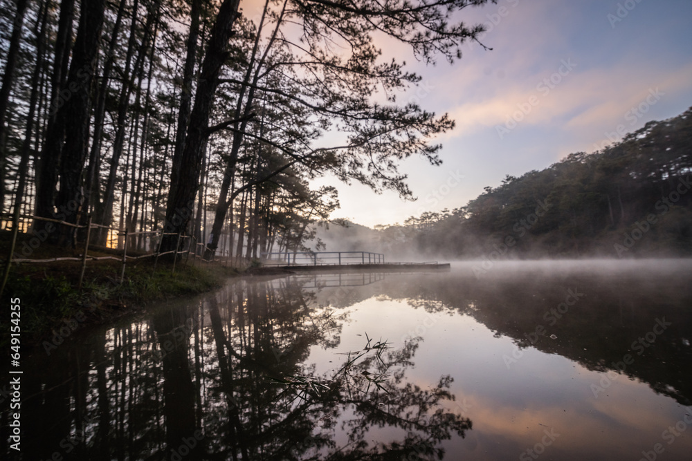 Dawn in the Golden Valley tourist area is filled with beautiful mist and a beautiful landscape of Da Lat Dawn in the Golden Valley tourist area is filled with beautiful mist and a beautiful landscape of Da Lat