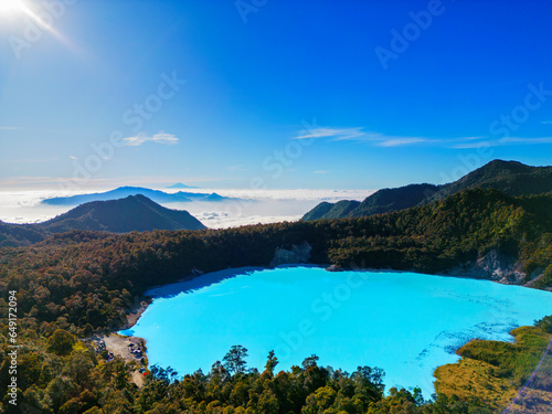 People camping by the crater lake in high in the mountain © Creativa Images