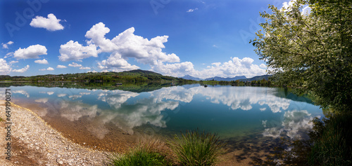 Austria, Upper Austria, Zell am Moos, Drone panorama of summer clouds reflecting in Irrsee lake photo