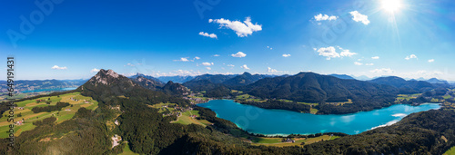 Austria, Salzburger Land, Fuschl am See, Drone panorama of Fuschl Lake and surrounding landscape in summer photo